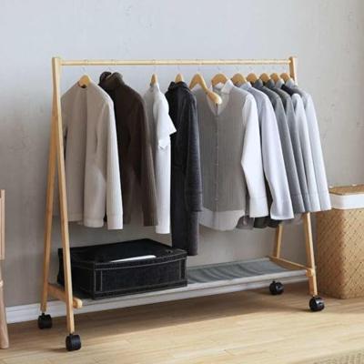 VidaXL Kledingrek met schappen en wielen 106x34x106,5 cm bamboe