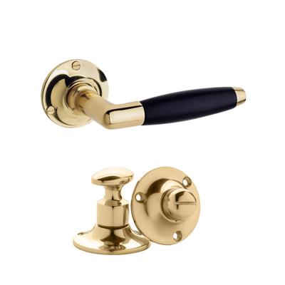 De Oude Deurklink Deurklink klassiek geveerd, messing gelakt, WC slot, rond De Oude Deurklink Deurklink klassiek geveerd, messing gelakt, WC slot, rond