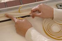 tesa E-Profil 05464-00101-02 Afdichtingstape tesamoll Bruin (l x b) 25 m x 9 mm 25 m - thumbnail