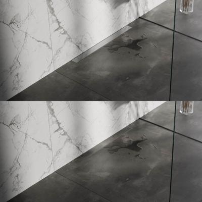 Douchegoot Brauer Geborsteld RVS Muur Montage Inclusief Vloerflens 70x7 cm Zero Tegelinlegrooster Omkeerbaar Brauer Douchegoot Brauer Geborsteld RVS Muur Montage Inclusief Vloerflens 70x7 cm Zero Tegelinlegrooster Omkeerbaar Brauer