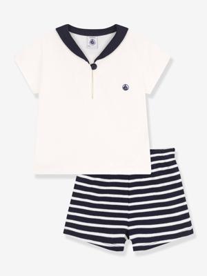 Een baby 2-delige set PETIT BATEAU met een trui met een col. marineblauw