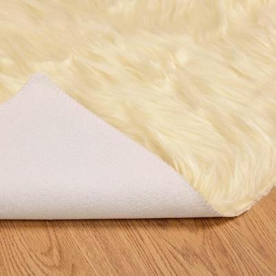 VidaXL Nep schapenvacht tapijt tafalla crème 100 x 200 cm polyester VidaXL Nep schapenvacht tapijt tafalla crème 100 x 200 cm polyester