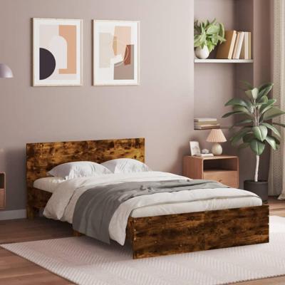 Bedframe met hoofdeinde gerookt eikenkleurig 135x190 cm
