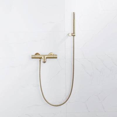 Fortifura Calvi Thermostatische badkraan met staafhanddouche, handdouchehouder en metalen doucheslang Geborsteld Messing PVD (Goud) SW720570/SW720567/SW720226/SW706206