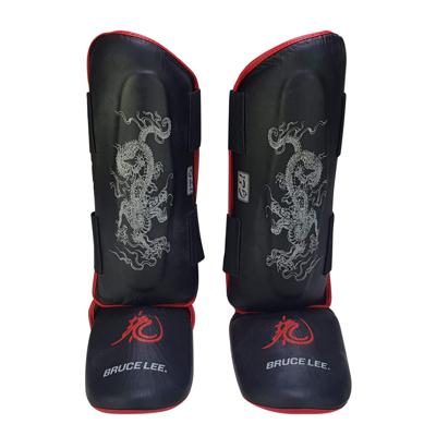 Bruce Lee Beenbeschermers Dragon Deluxe Zwart/rood Maat S/m Bruce Lee Beenbeschermers Dragon Deluxe Zwart/rood Maat S/m