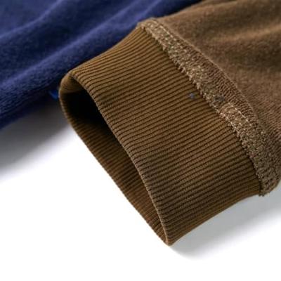 Kindertrui met patchwork-ontwerp 92 donkermarineblauw Kindertrui met patchwork-ontwerp 92 donkermarineblauw