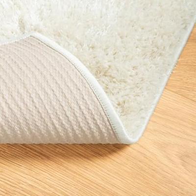 Vloerkleed hoogpolig glanzend 140x200 cm crmekleurig