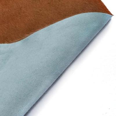 VidaXL Vloerkleed 150x170 cm echte runderhuid bruin en wit VidaXL Vloerkleed 150x170 cm echte runderhuid bruin en wit
