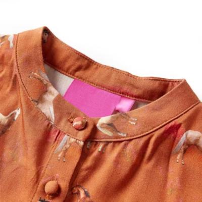 Kinderjurk met paardenprint 116 cognackleurig Kinderjurk met paardenprint 116 cognackleurig