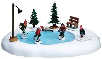 Lemax after school hockey match bewegende schaatsbaan Caddington Village 2009