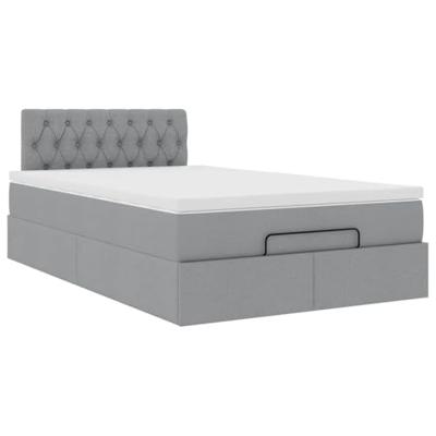 Ottoman bed met matras en LED's 120x200 cm stof lichtgrijs