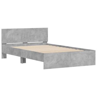 Bedframe met hoofdeinde betongrijs 135x190 cm
