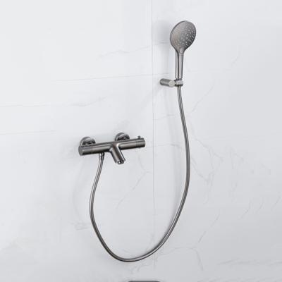Fortifura Calvi Thermostatische badkraan met ronde handdouche, handdouchehouder en gladde doucheslang Geborsteld Gunmetal PVD SW799451/SW720568/SW720225/SW721165