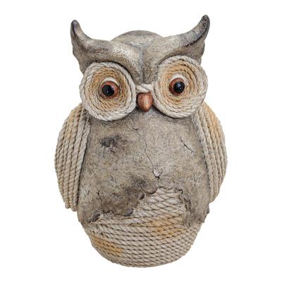 Uil in grijs van magnesia, B32 x D26 x H46 cm