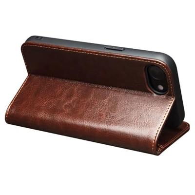 Qialino iPhone 16e hoesje - Leren bookcase - Bruin