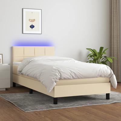 Boxspring met matras en LED stof crèmekleurig 140x190 cm