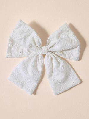 Katoenen strik met dierenborduurwerk beige