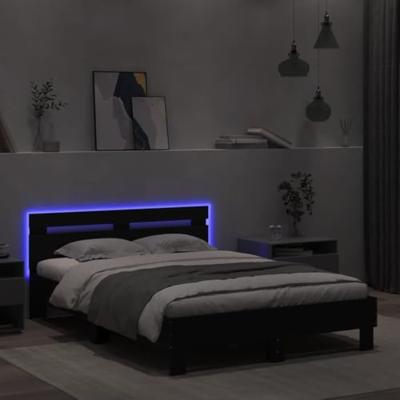 Bedframe met hoofdeinde en LED zwart 135x190 cm