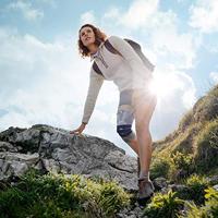 Bauerfeind GenuTrain met Siliconenboord (Tweedekans) Kniebrace - 5 - Universeel - Grijs - thumbnail