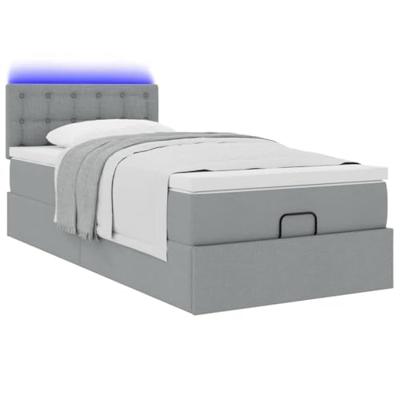 Ottoman bed met matras en LED's 100x200 cm stof lichtgrijs