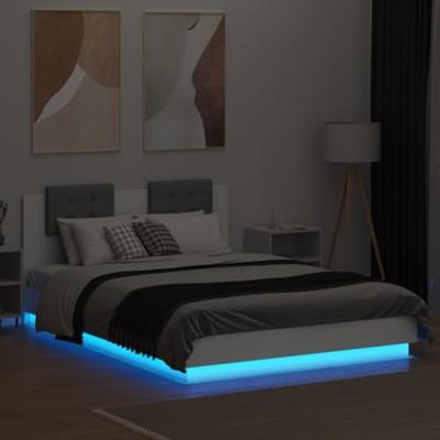 Bedframe met hoofdbord en LED-verlichting wit 140x200 cm