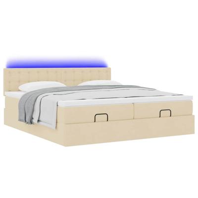 Ottoman bed met matrassen en LED's 180x200cm stof crèmekleurig
