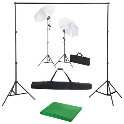 Fotostudioset met achtergrond, lampen en paraplu's