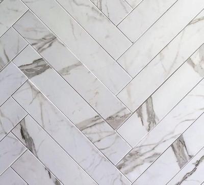 Tegelstroken Statuario mat 10x60 rett