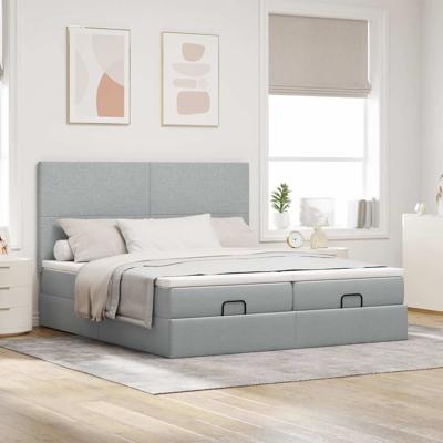 Ottoman bed met matrassen en LED's 200x200cm stof lichtgrijs