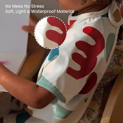 Meegroeislabbetje met mouwen 2-in-1 BEABA Playful beige