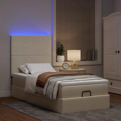 Ottoman bed met matras en LED's 120x190cm stof crèmekleurig