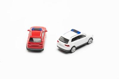 Herpa 013109-002 H0 Auto Volkswagen Tiguan met waarschuwingsbalk, rood en wit