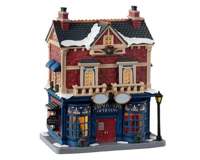 Lemax simpson & sons opticians verlicht kersthuisje Caddington Village 2023