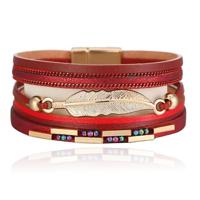 Deja Armband goudkleurig rood met veer en strass - thumbnail