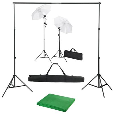Fotostudioset met achtergrond, lampen en paraplu's