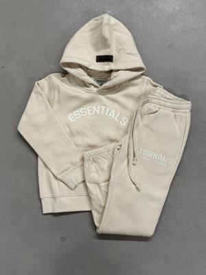 Cou7ure Essentials Basic Curve Trainingspak Kids Beige - Maat 140 - Kleur: Beige | Soccerfanshop