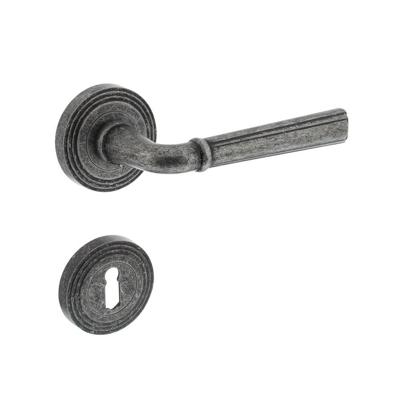 Deurkruk Bellevue op rozet met sleutel plaatjes oud grijs