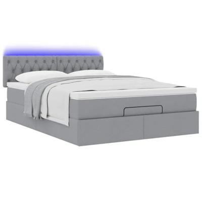Ottoman bed met matras en LED's 140x200cm stof lichtgrijs
