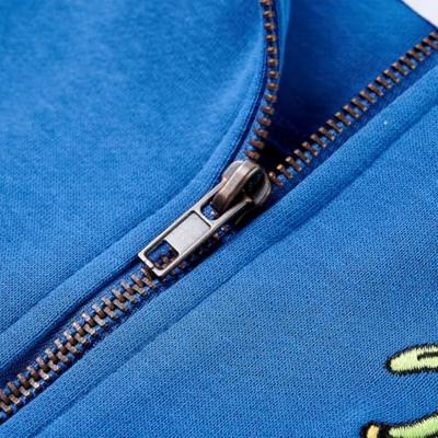 Kindervest met capuchon en rits 104 blauw Kindervest met capuchon en rits 104 blauw