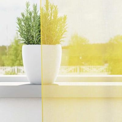 Gordijnen voile met doorvoertules 2 st geel