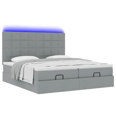 Ottoman bed met matrassen en LED's 180x200cm stof lichtgrijs