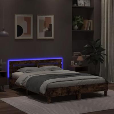 Bedframe met hoofdeinde en LED gerookt eikenkleurig 140x190 cm