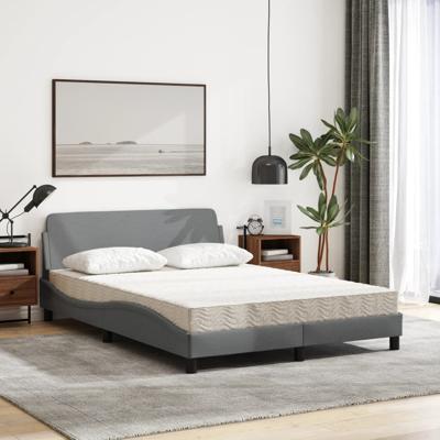Bed met matras stof lichtgrijs 140x200 cm