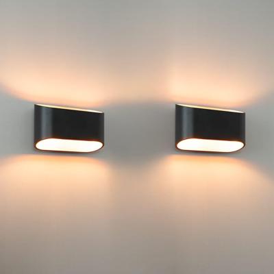 2x Volans nero oro by LUSENZ - Ovaalvormige wandlamp met up and downlight, matzwarte coating en goudkleurig interieur
