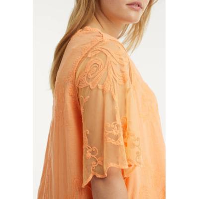 Yesta semi-transparante top Leia met open detail oranje Yesta semi-transparante top Leia met open detail oranje