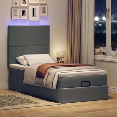Ottoman bed met matras en LED's 140x190cm stof donkergrijs - thumbnail