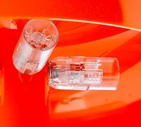 Artemide Nessino tafellamp oranje - thumbnail