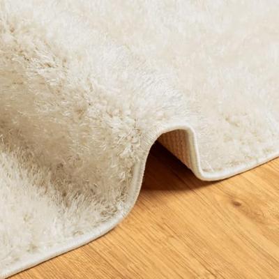 VidaXL Vloerkleed istan hoogpolig glanzend 140x200 cm crèmekleurig VidaXL Vloerkleed istan hoogpolig glanzend 140x200 cm crèmekleurig
