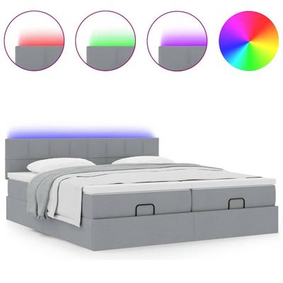 Ottoman bed met matrassen en LED's 160x200cm stof lichtgrijs