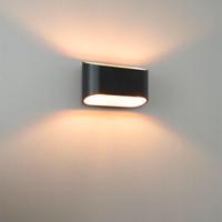 Volans nero oro by LUSENZ - Ovaalvormige wandlamp met up and downlight, matzwarte coating en goudkleurig interieur - thumbnail